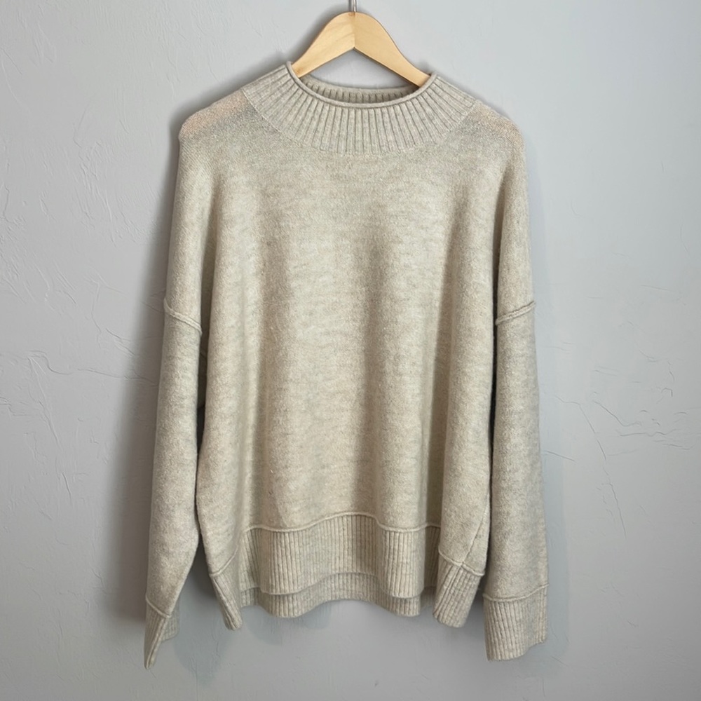 Cream sweater